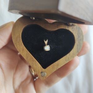 14k Rare Vintage Tension set diamond pendant.